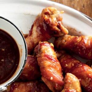 Bacon-Wrapped Chicken Wings with Bourbon Barbecue Sauce